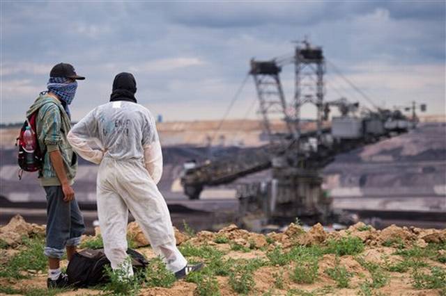 Protesters Storm Open-Pit Coal Mine in Western Germany