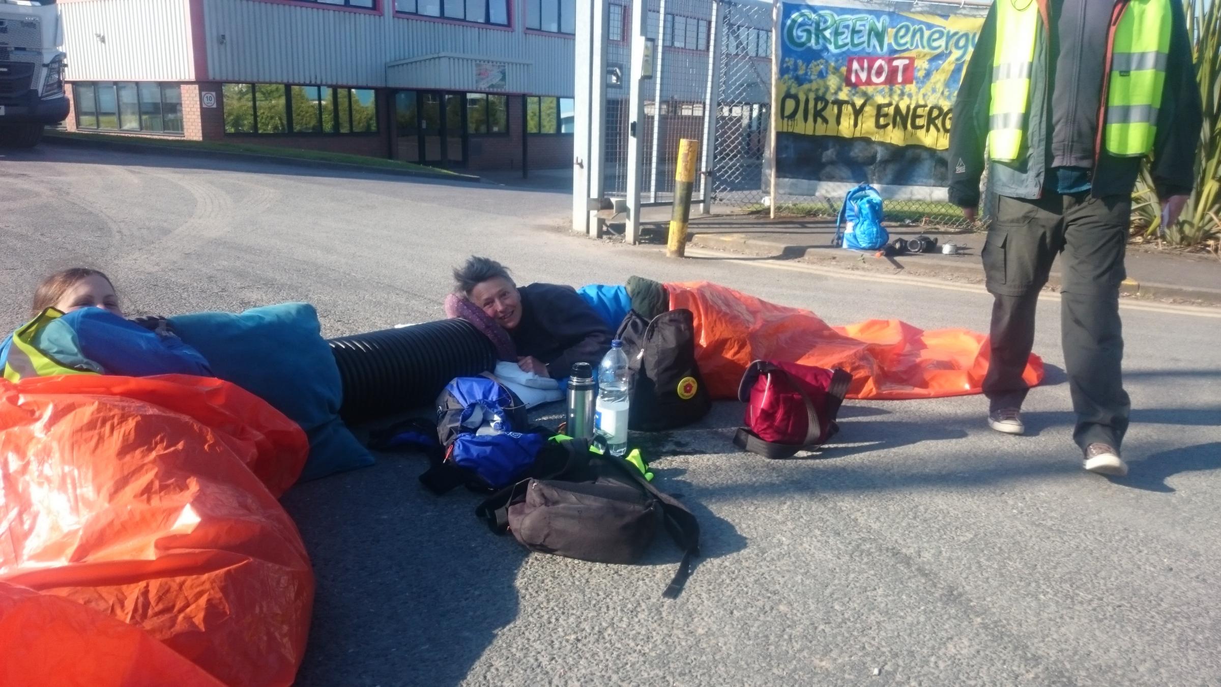 PROTEST: The two campaigners lying in the road